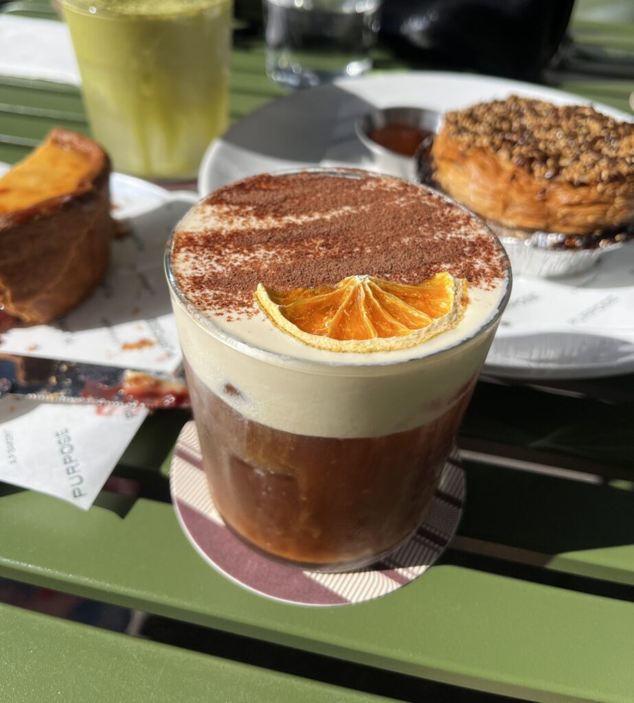 mont blanc coffee- cold brew topped with think layer of sweetened, citrus-perfumed cream