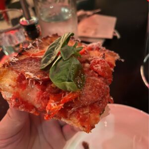 city oltra salami slice 1 with soppressa salami, hot peppers and generous basil topped with chili oil
